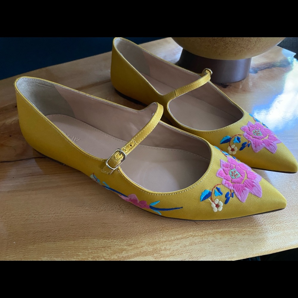 Yellow J. Crew flats with floral embroidery
